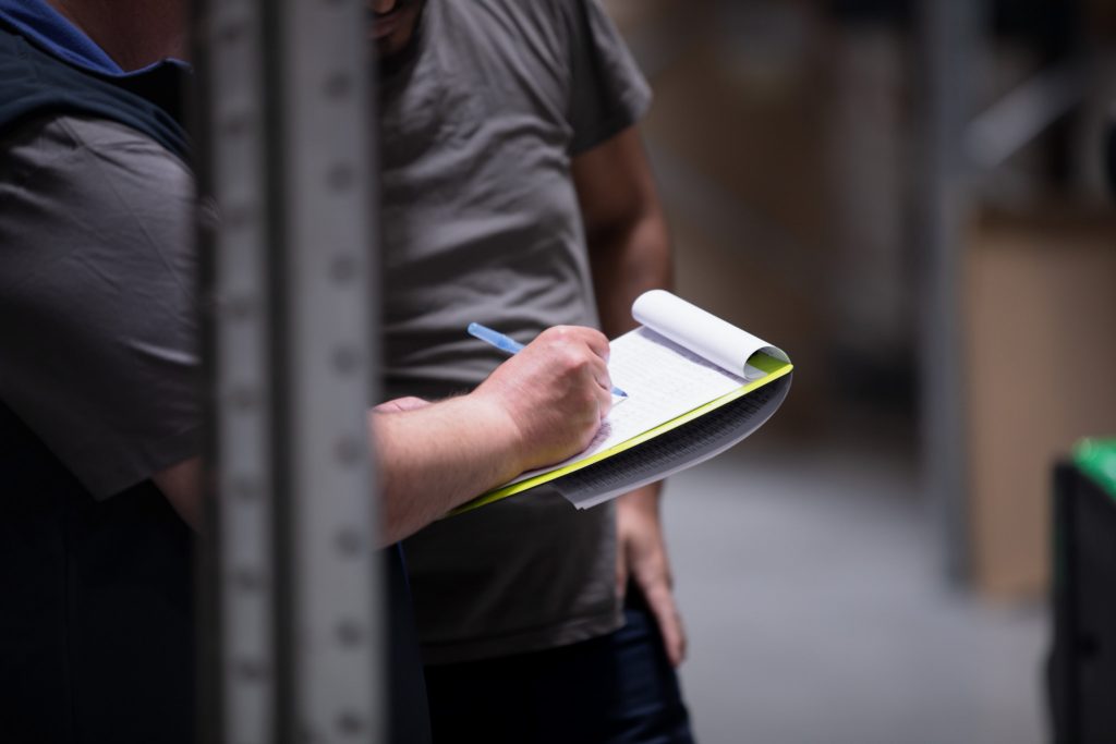 Stock check in a parts warehouse, from a commercial shoot