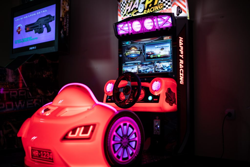 Hotel Uzunski – arcade racing machine in the games room
